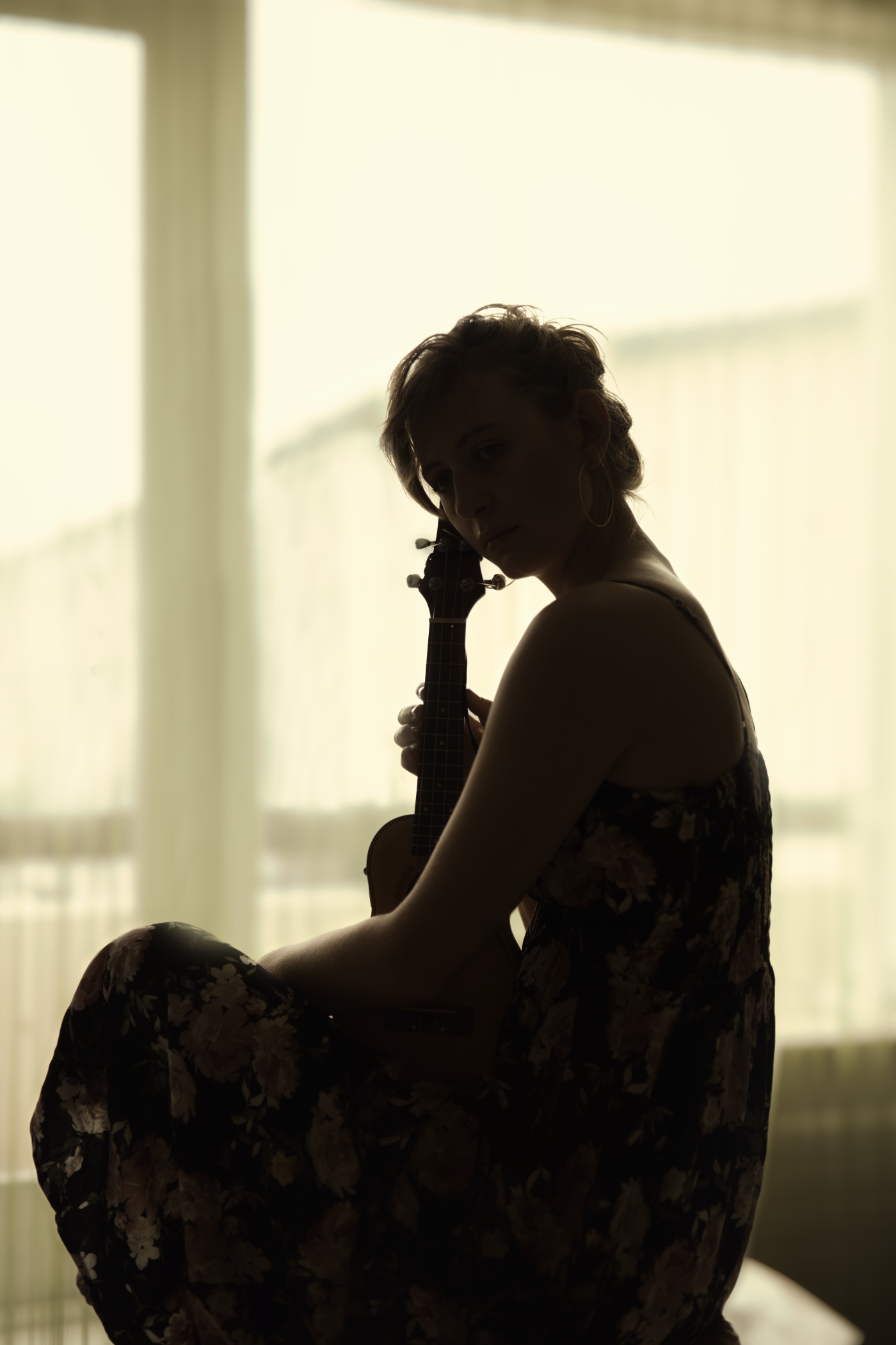 Woman with ukulele photo